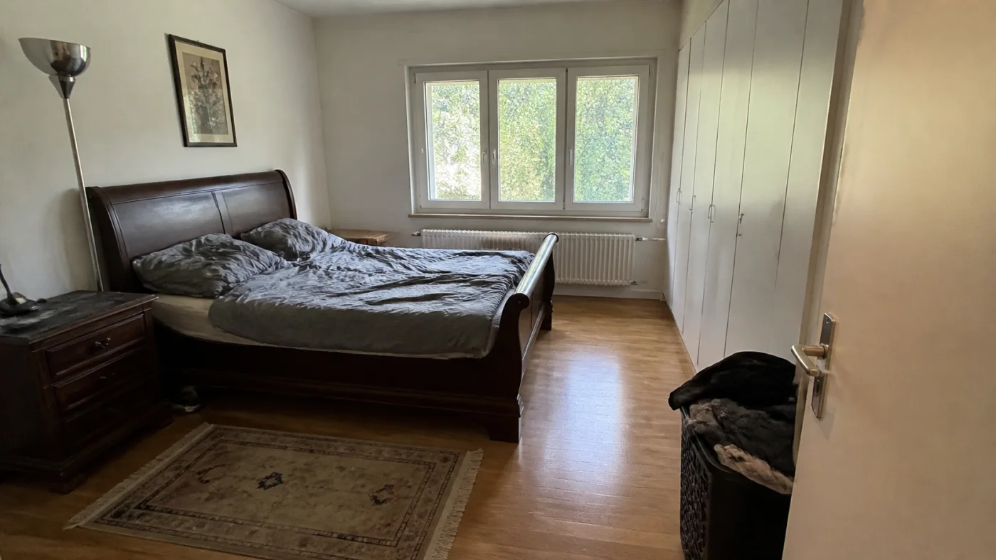 Before: Before and after comparison of a plain bedroom and a polished AI bedroom redesign