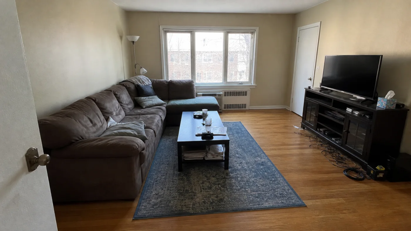 Before: Living room before and after AI design example with an unchanged doorway and clear circulation